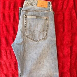 American Eagle Denim with Gold Stitching